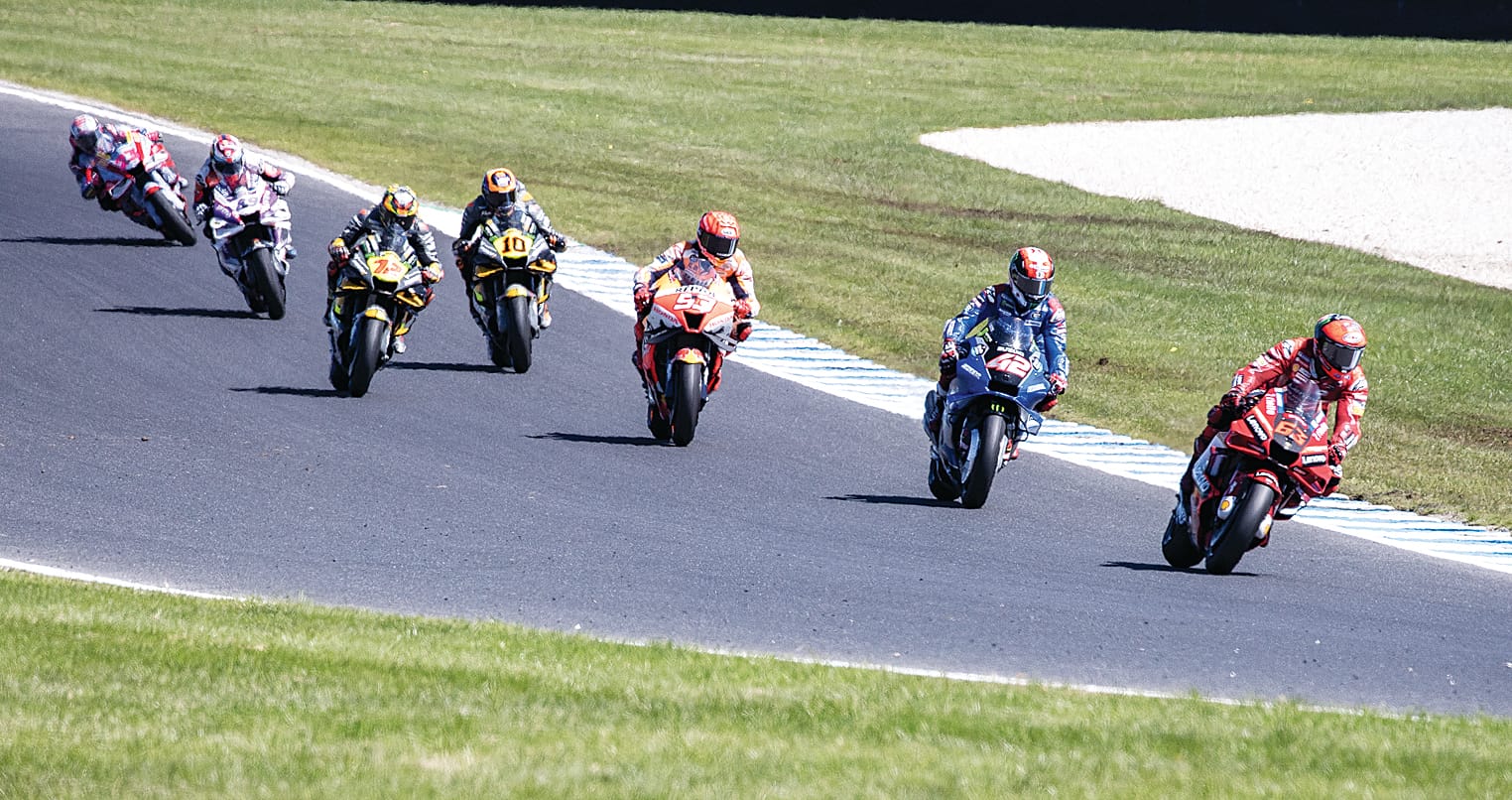 The heat is on as Bagnaia leads Rins followed by Marquez on the way up to Lukey Heights.