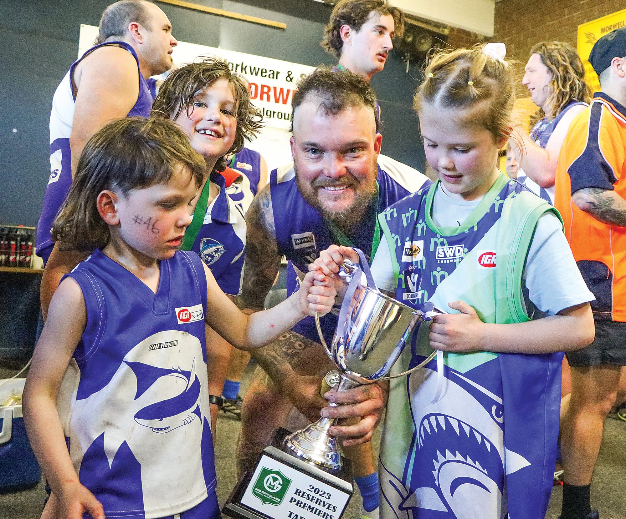 Nick Tucker enjoys the moment with his kids after playing in Tarwin’s Reserves premiership side. A31_3823