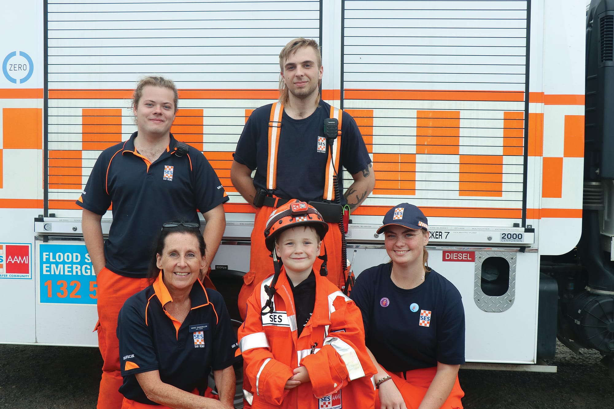 Young Jaxton Passarin dressed up as an SES volunteer with unit controller Mandy Chancellor and the San Remo SES volunteers at the Kilcunda Lobster
Festival. Z37_0523