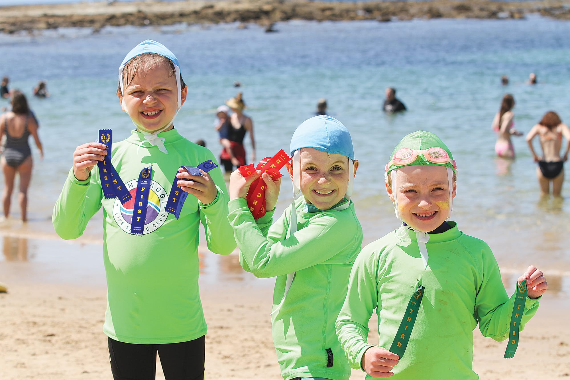 U7 Junior Nippers Champion Eddie with Harrison and Ava from the WLSC. B98_0225