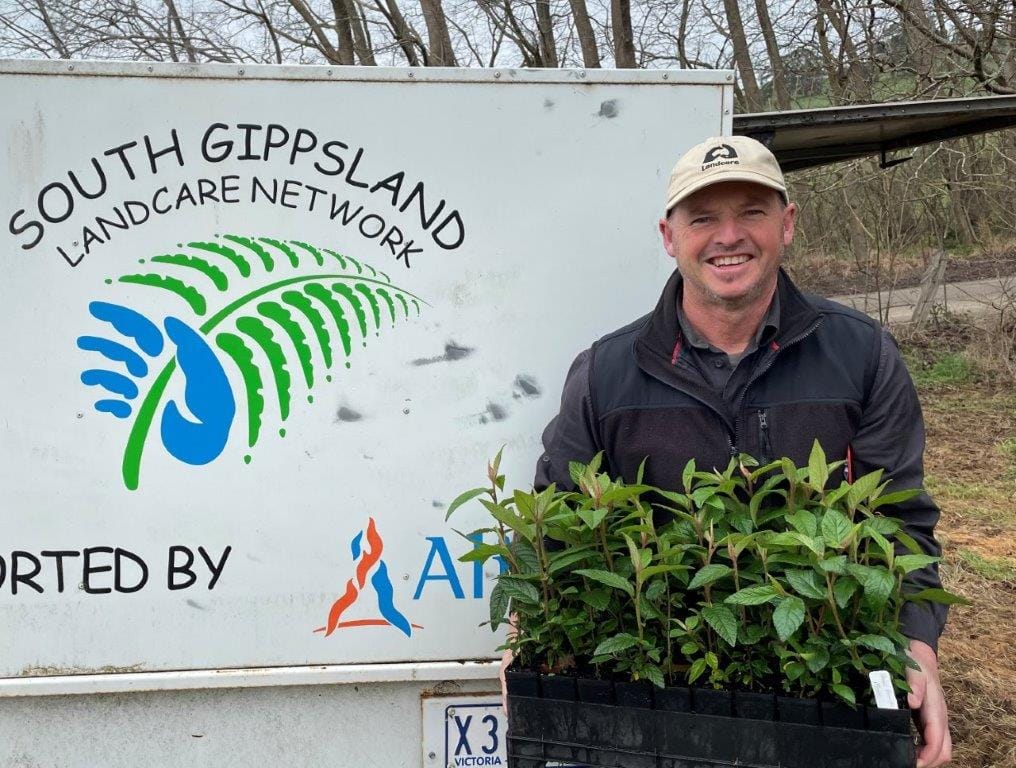 South Gippsland Landcare Network (east) facilitator Nick Stephens lends a hand at the tree planting day at Jeetho on Sunday.