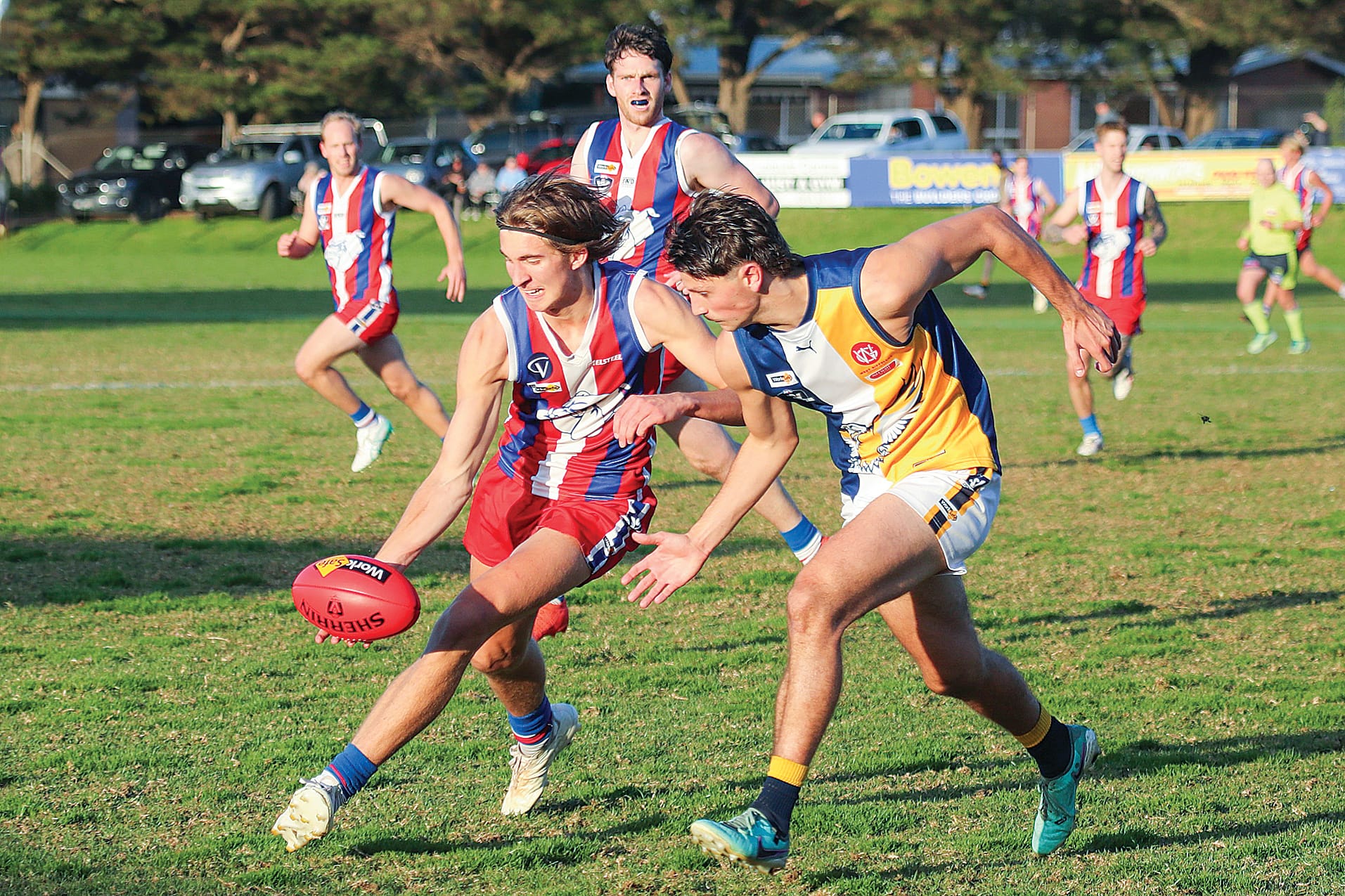 Zac Walker gains control of the ball before booting it. Photo: Carol Ratcliff.