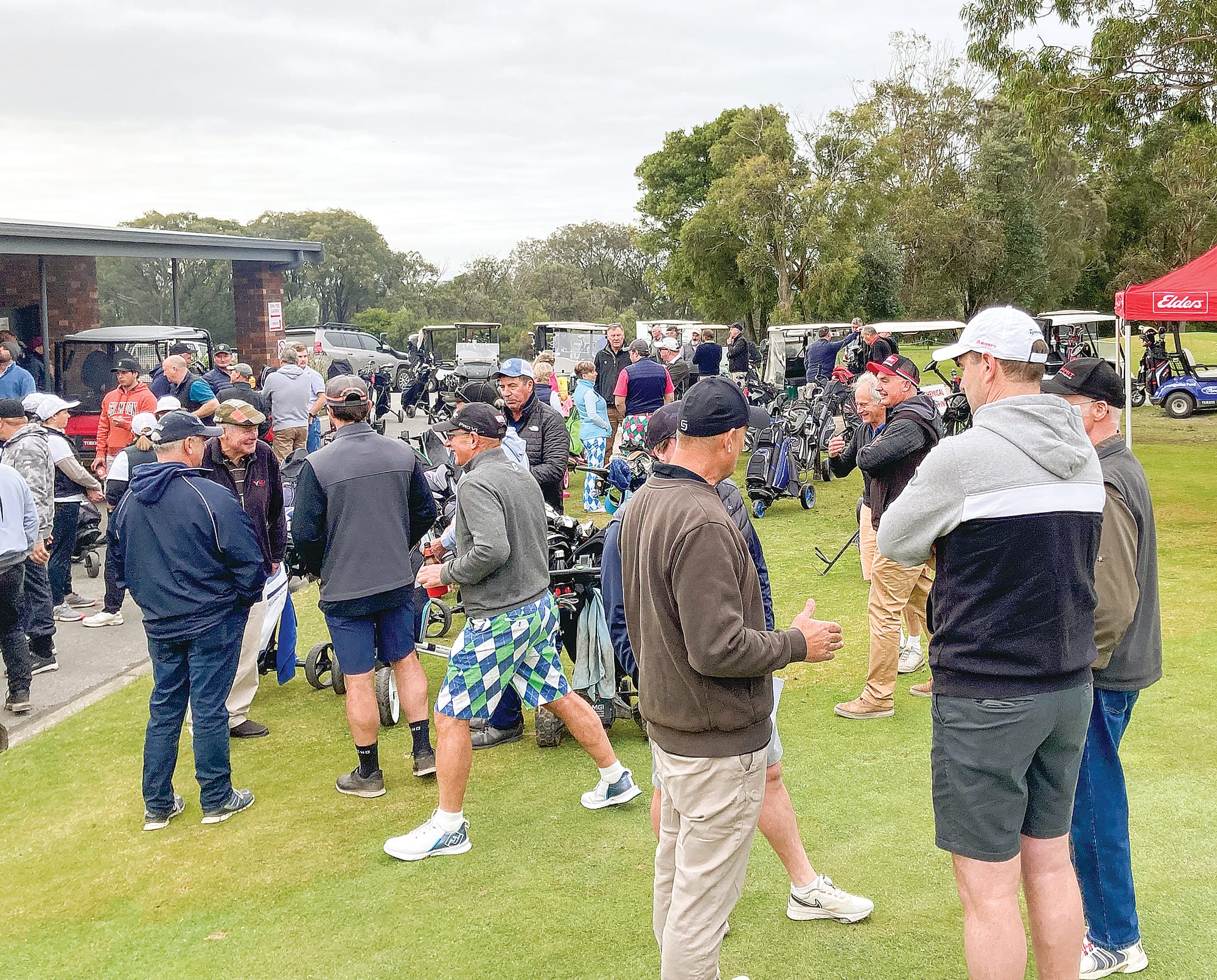 Players getting ready for a good morning of golf with a hearty barbeque breakfast, coffee, beer and a good old catch up.  