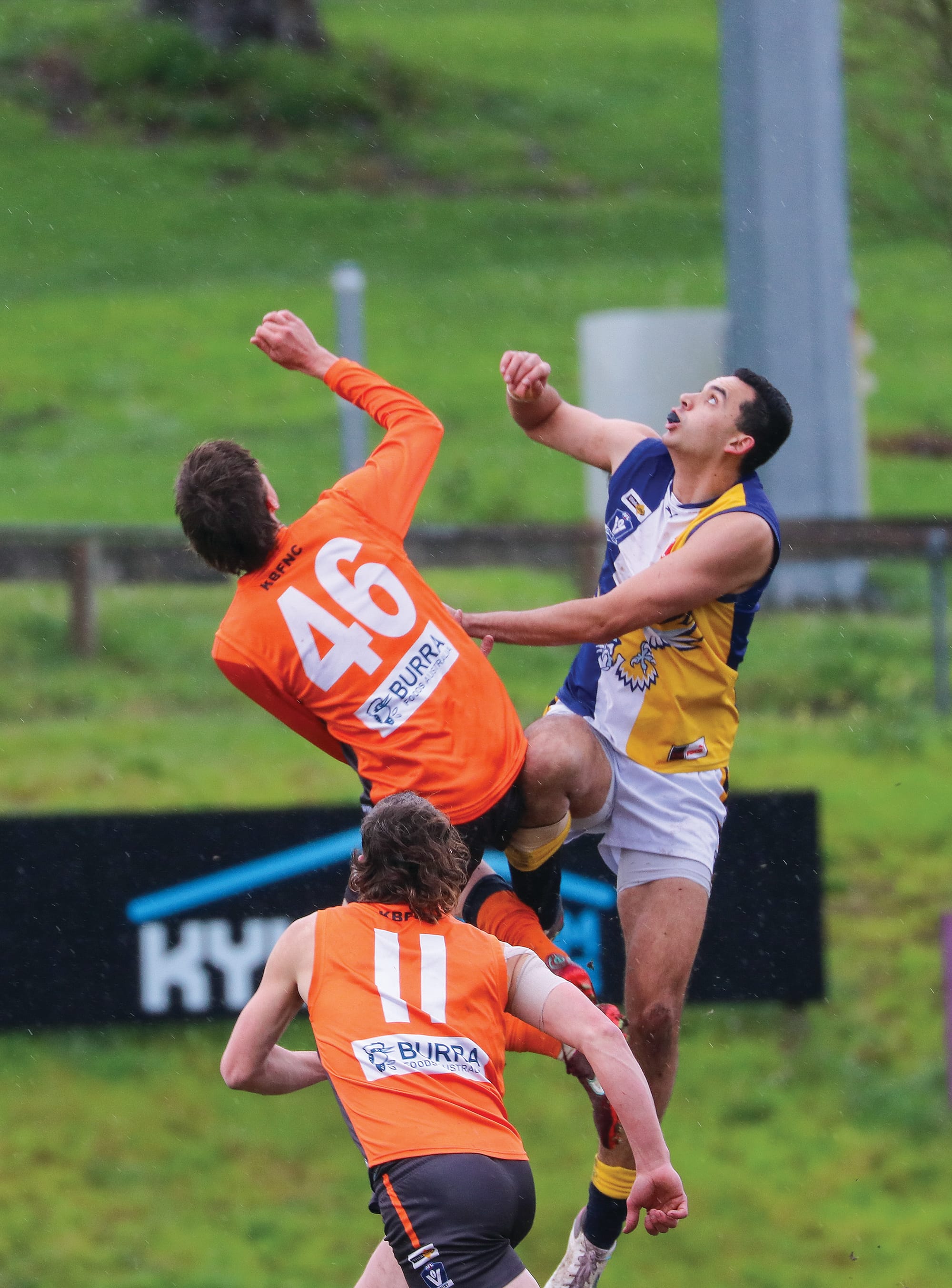 Jack Spencer goes up against Marcus Toussaint in the first quarter. Z44_3323 