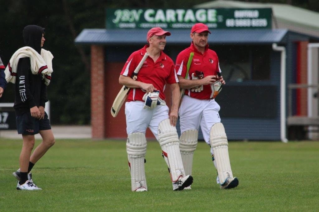Dave Trotman 24 and Dave Baldi 99 not out take a break in the match between Nerrena and Meeniyan at Meeniyan.