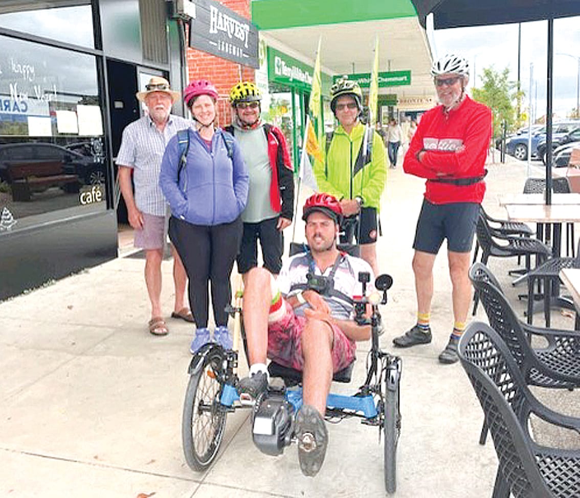 Tommy Quick in Leongatha’s Bair Street after he and his supporters stopped for a break and a well-earned meal and coffee. Behind him are dad Clive Quick, Geraldine McClure, Mark Lowry, David Jones, and Ewan Smith.