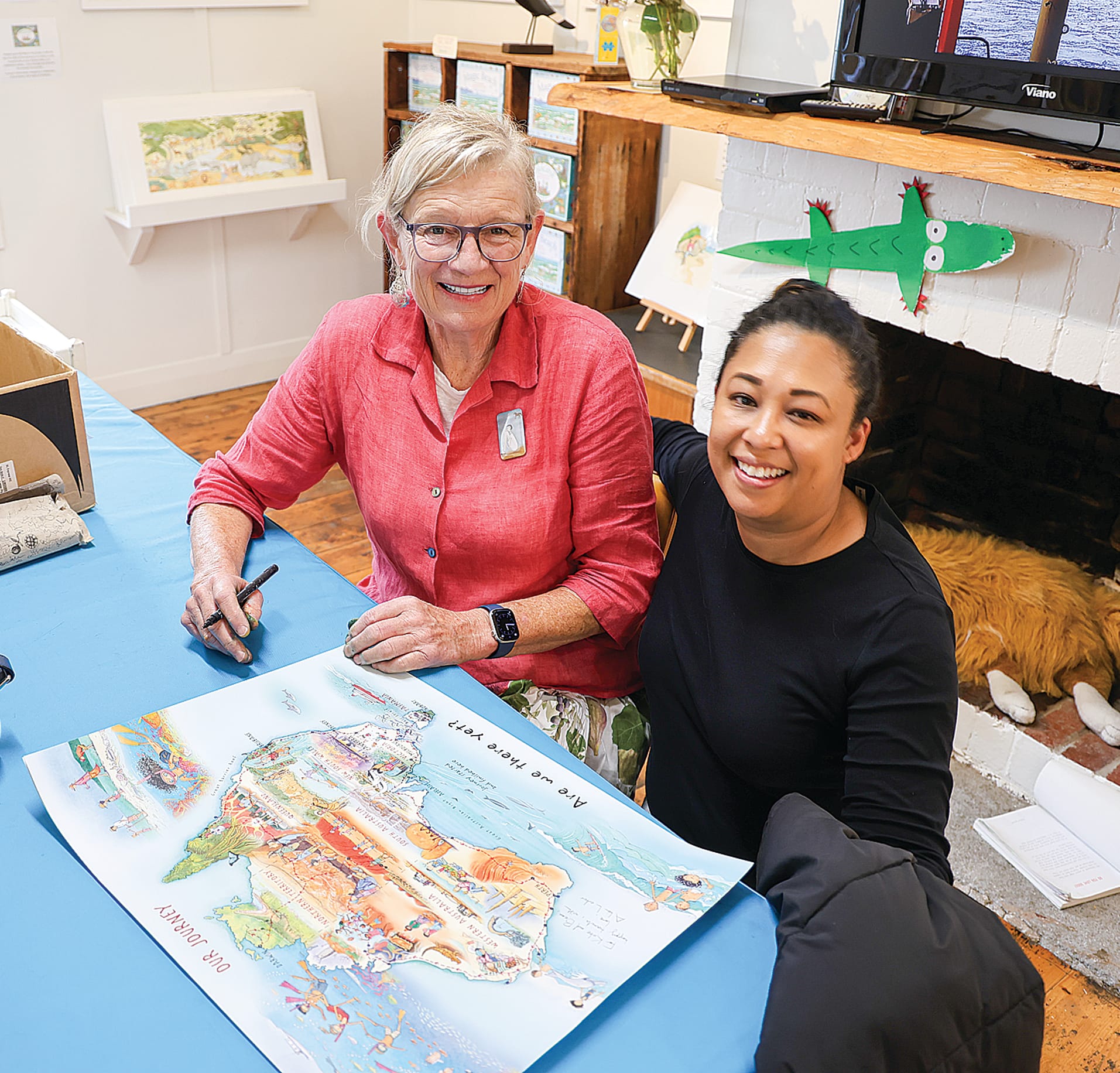 Fish Creek children’s author Alison Lester celebrated the 10th birthday of her bookshop and her own birthday last Sunday, signing books and posters, including this one for Michelle Buckingham.