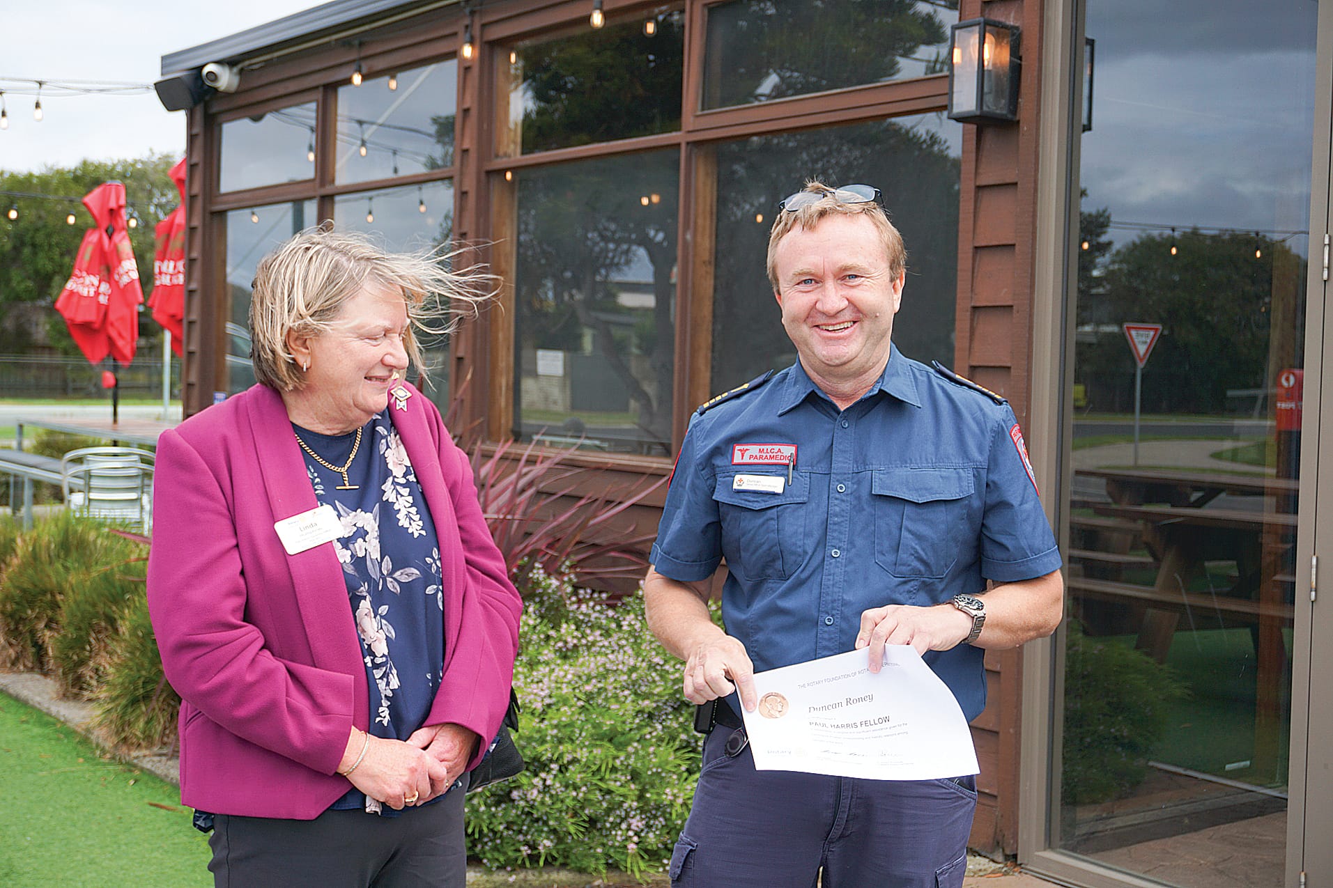 MICA paramedic Duncan Roney was presented with a Paul Harris Fellow award from the Rotary Club of Wonthaggi. He is pictured with past District Governor Linda Humphries. Ns19_4124