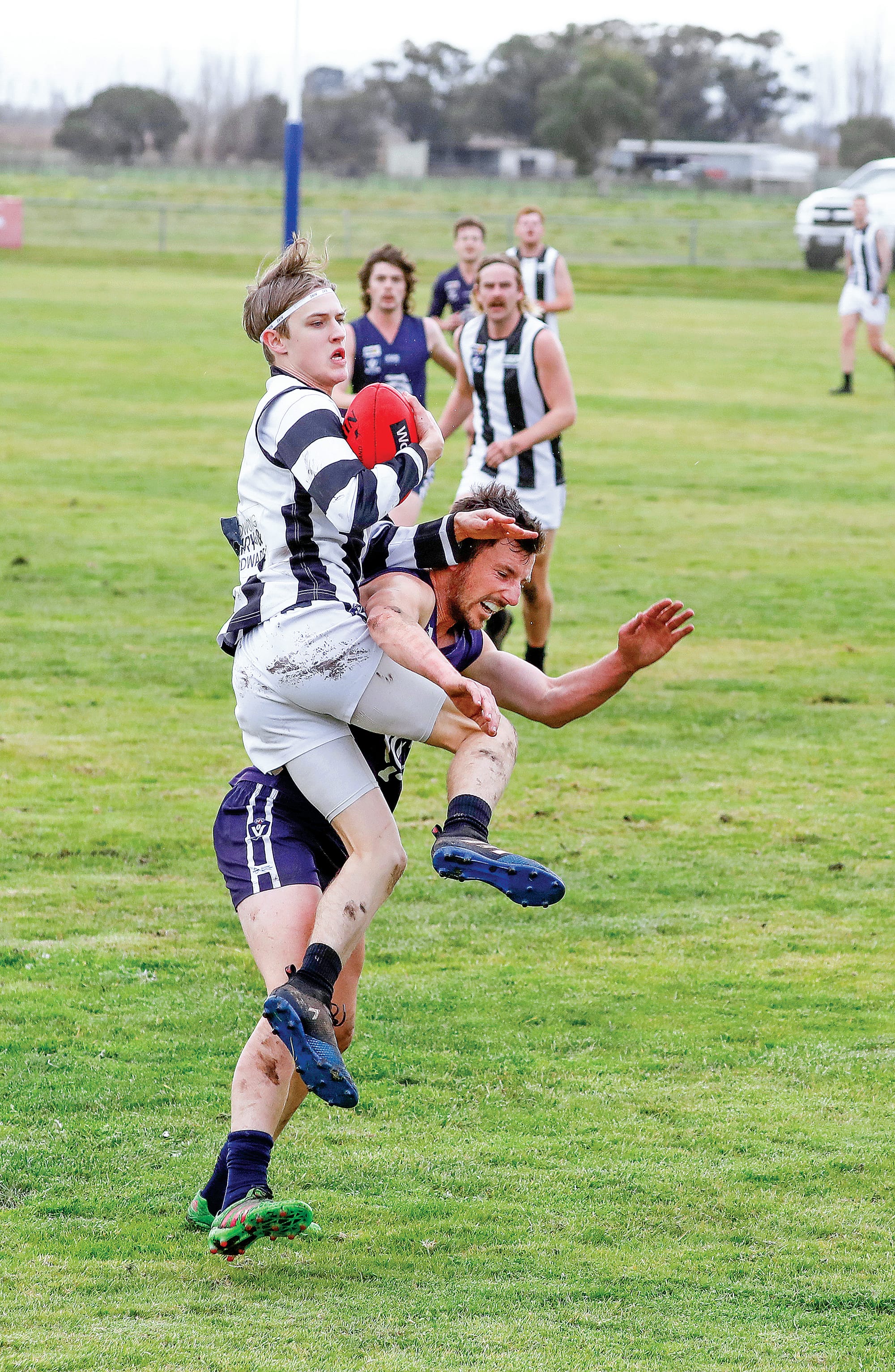 Poowong’s Noah Peacock in action against Catani, a photo that was used on the front of the Ellinbank League ‘Follower’. (Photo by Jeff Tull).