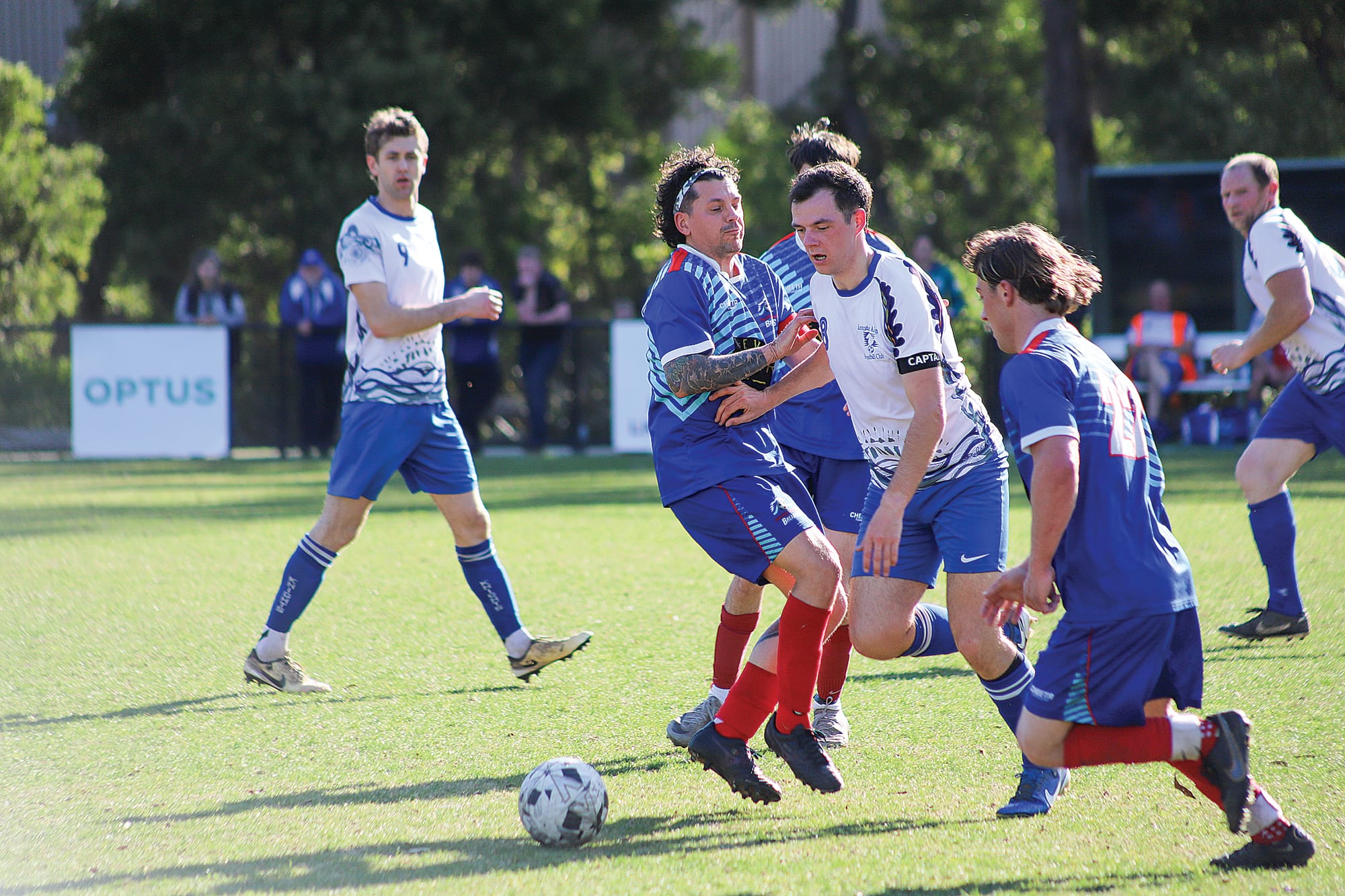 Leongatha Senior Men’s captain Luke Knights is swarmed by opponent midfields as he works hard to maintain possession. 