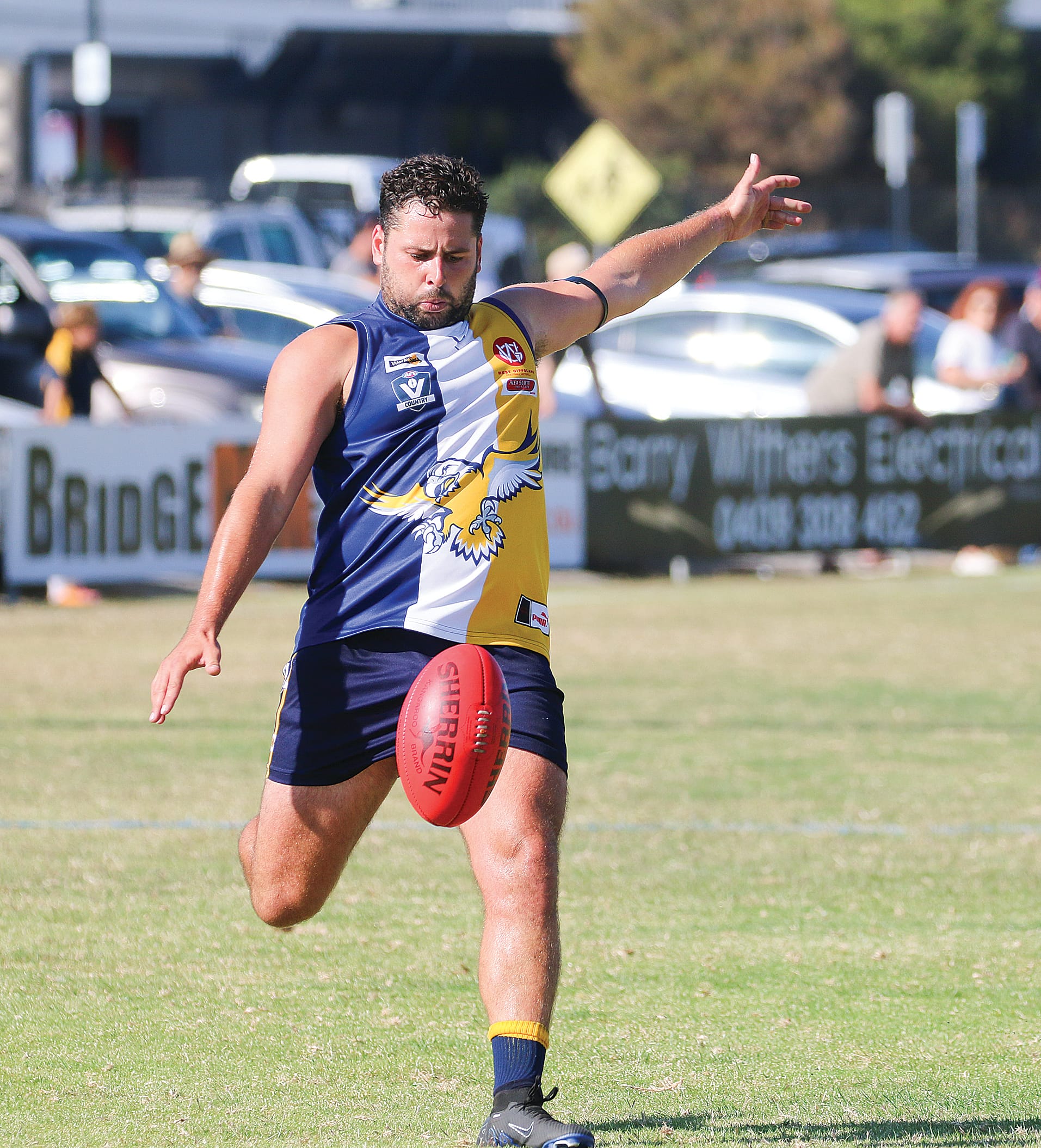 Jordan Tomas boots a goal for Inverloch-Kongwak.