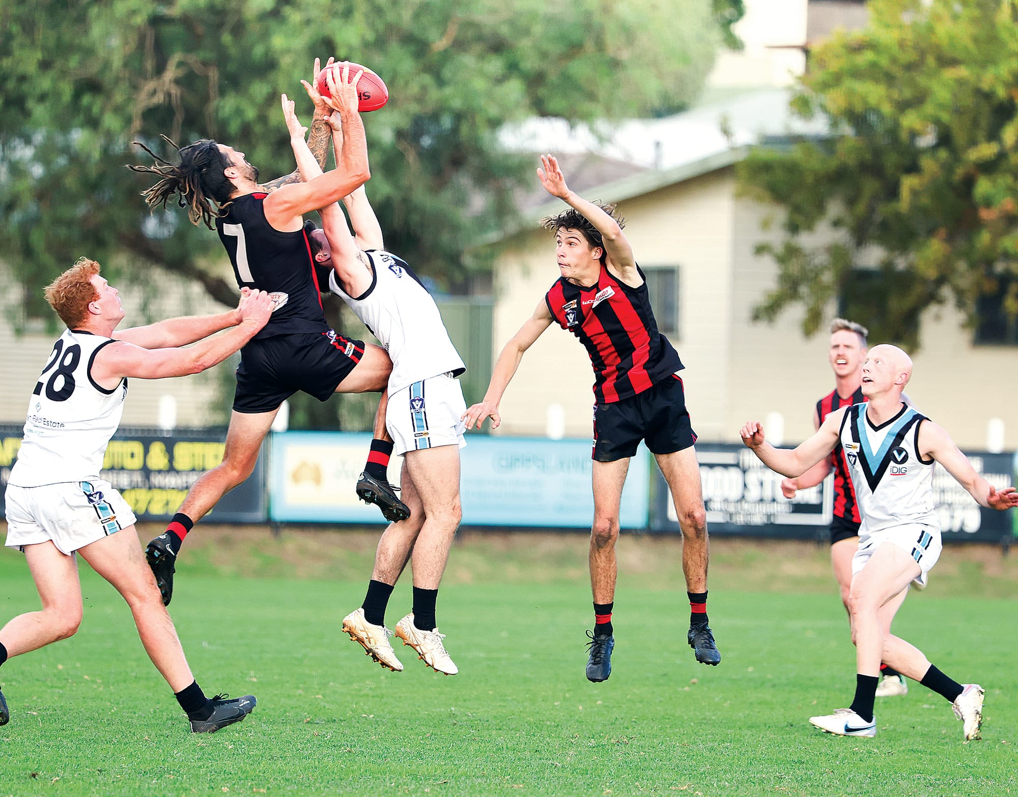 Maffra’s Daniel Bedggood gets up to take a rare mark in the forward 50.