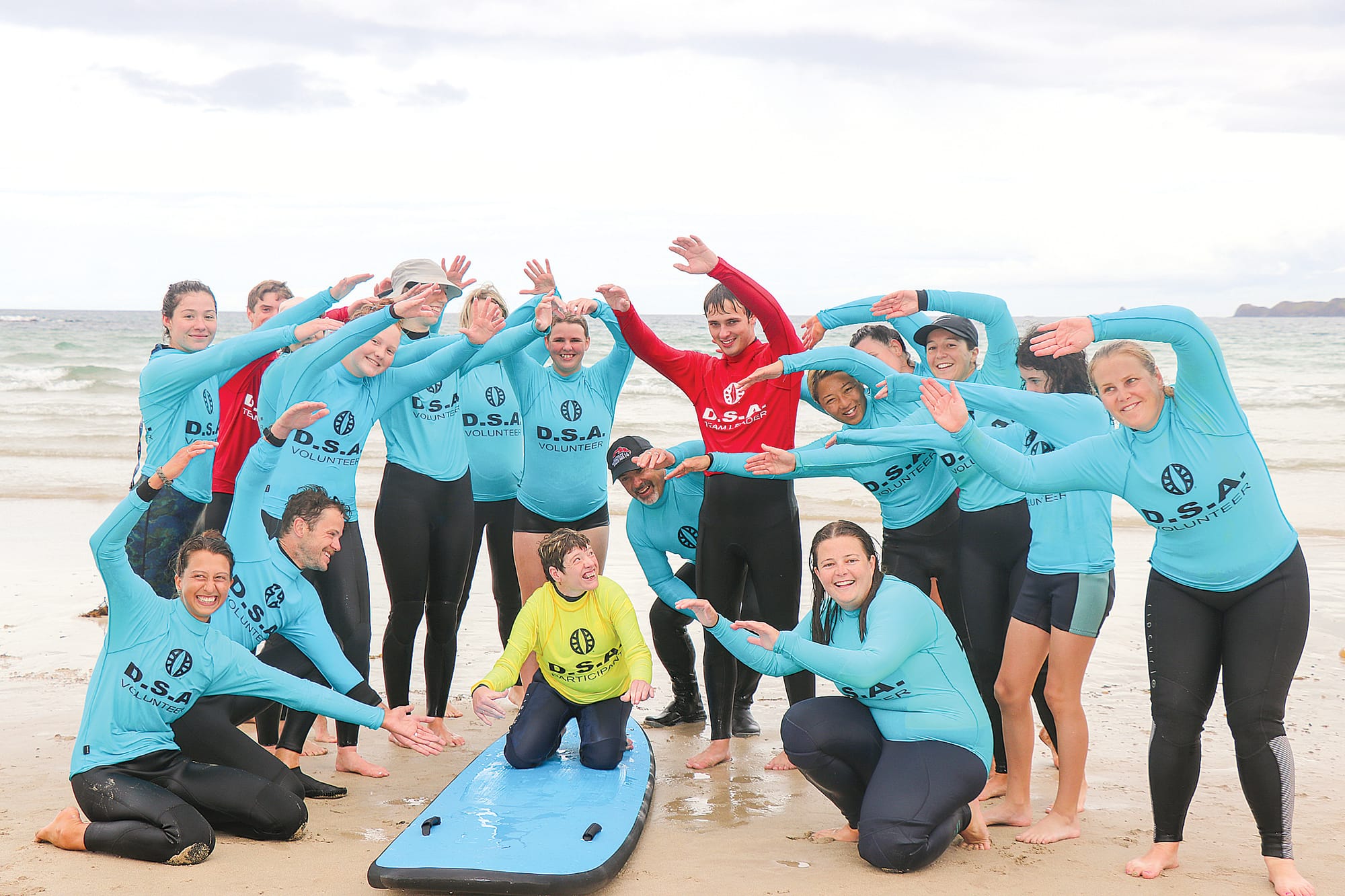 The community involvement allows DSA participants to safely transfer from a wheelchair to a surfboard and hit the waves safely. Z11_4622