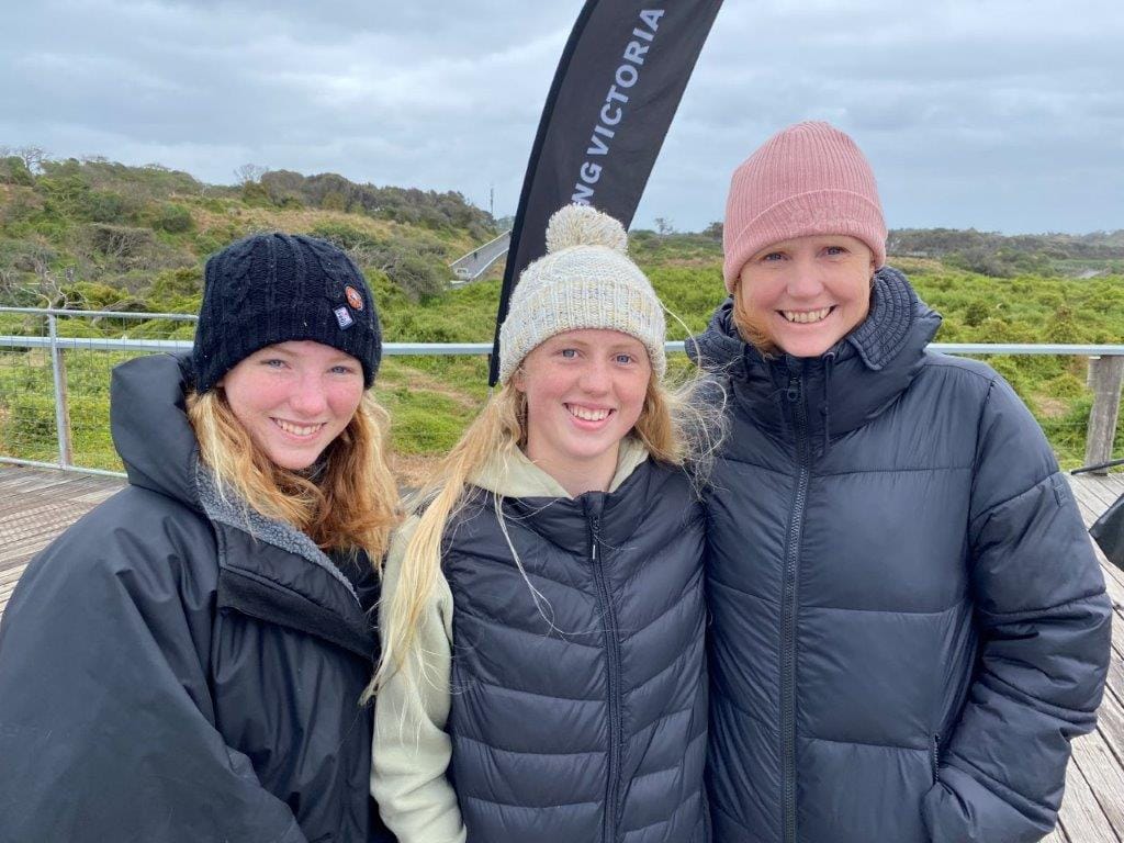 Inverloch surfing family; Sarah, Sonia and Bec Seuren rugged up for the wintry conditions at the state junior surfing titles at Phillip Island on the weekend.