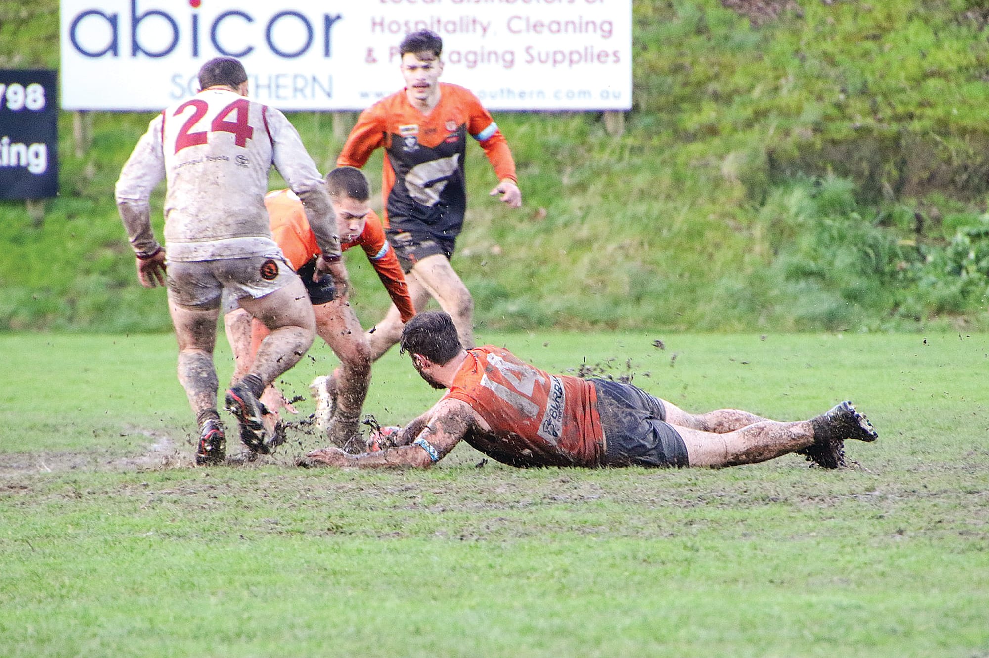 Hugh Gordon slides in for Korumburra-Bena against Warragul Industrials.