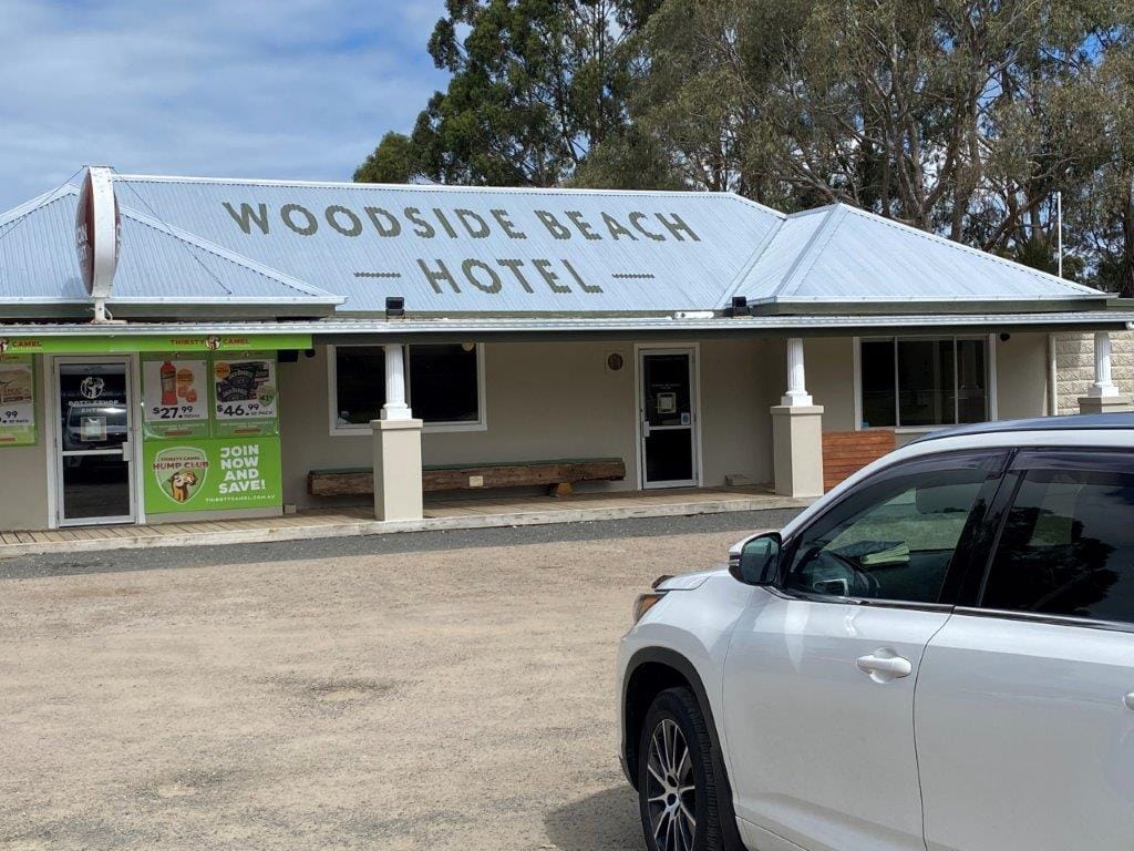 It's practically irresistible after a hard day's work, a great day's fishing or whatever it is you've been doing, stop in at the new-look Woodside Beach Hotel.