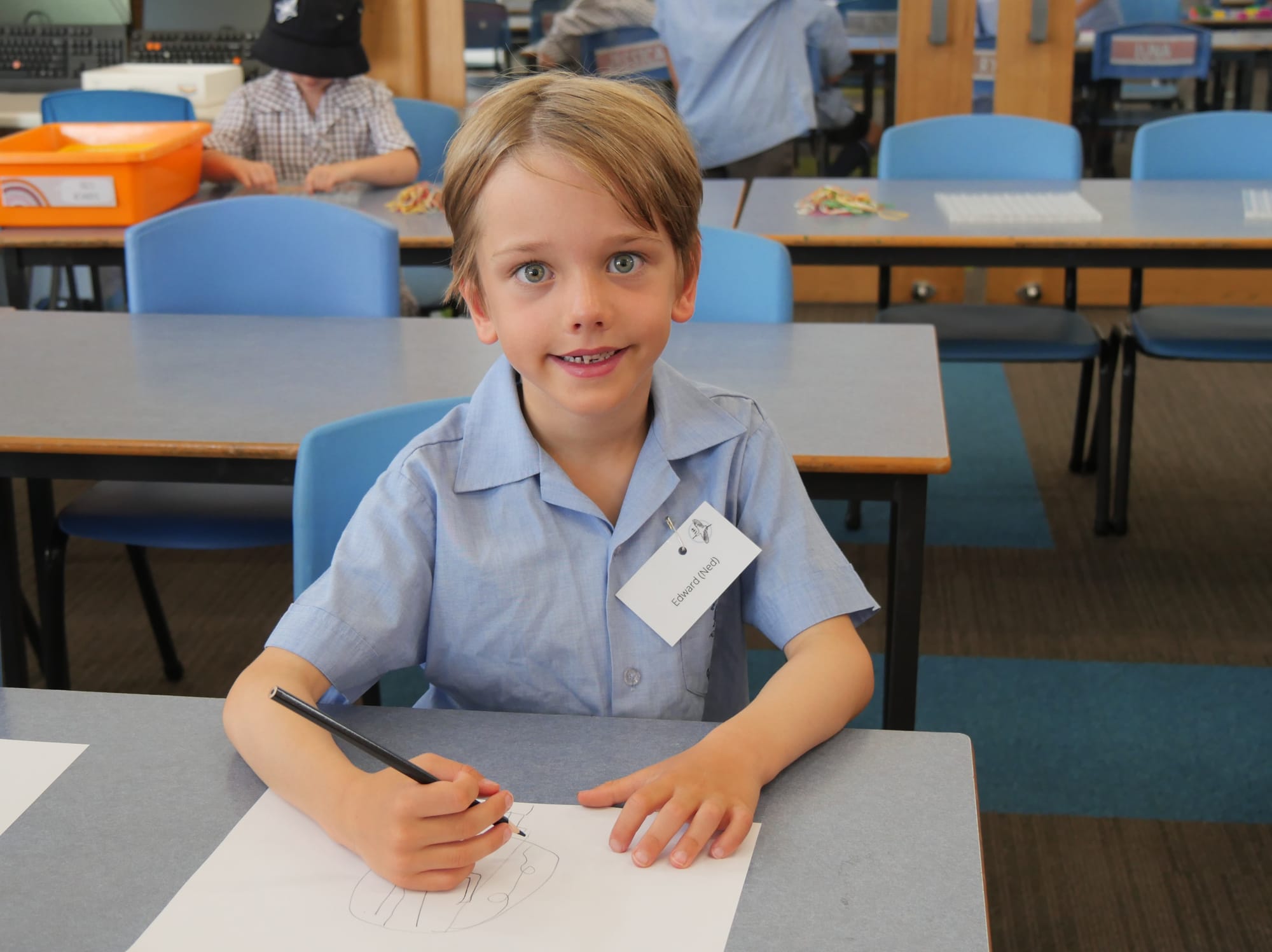 Prep Ned Webb settled in very quickly to Miss Bassed’s classroom, picking up a pencil and drawing a picture.