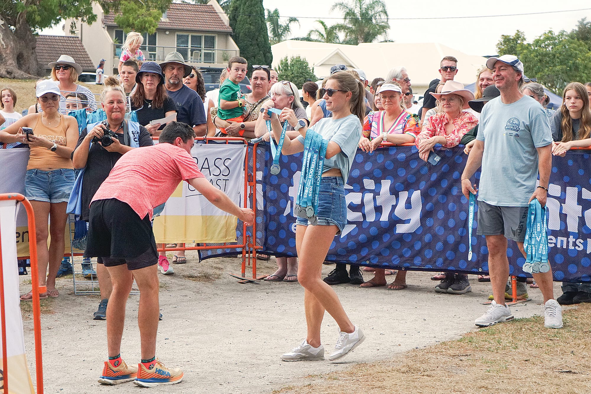Handing out the medals during the five-kilometre run.