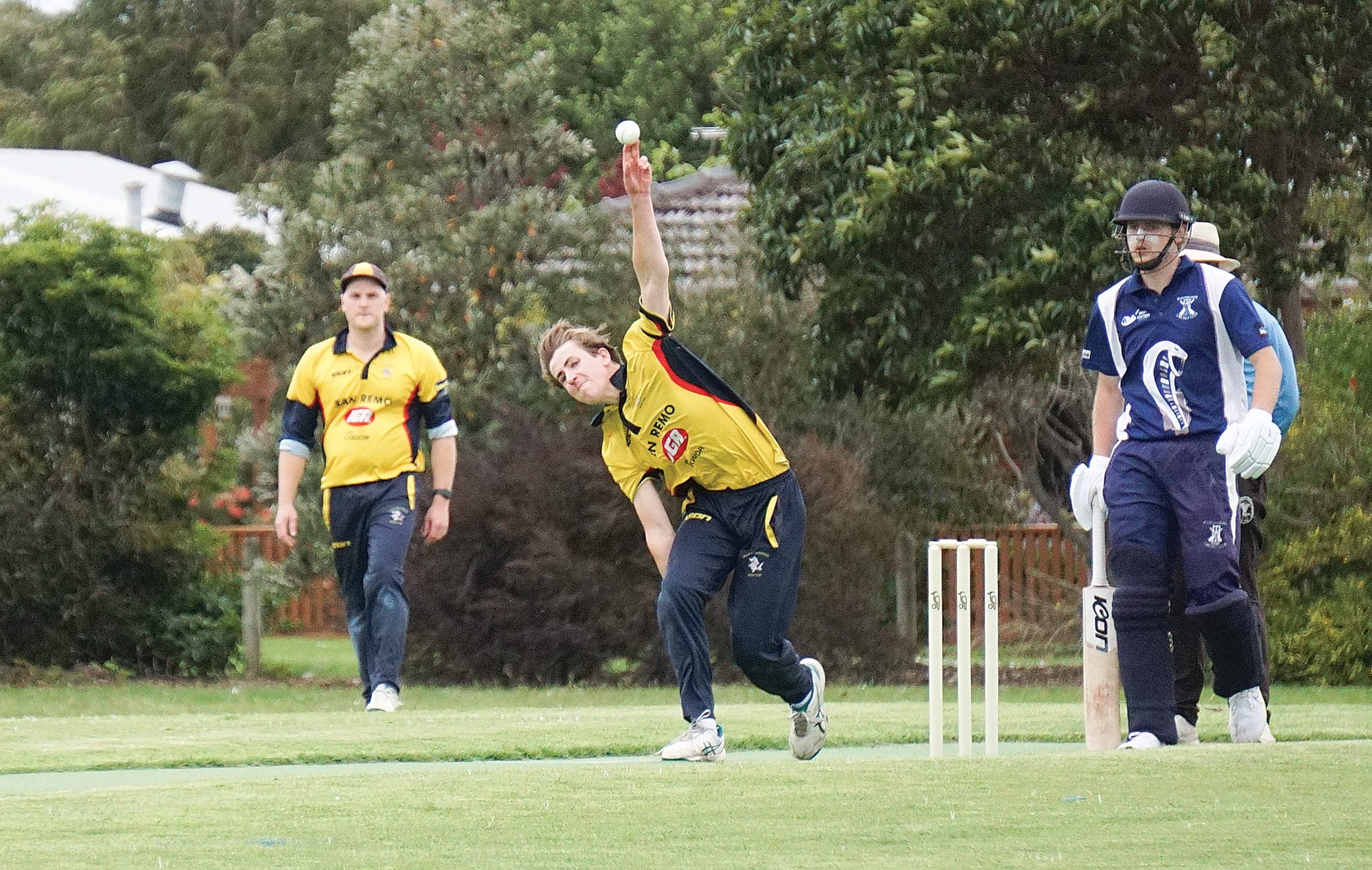 George McCausland sends it down the pitch.