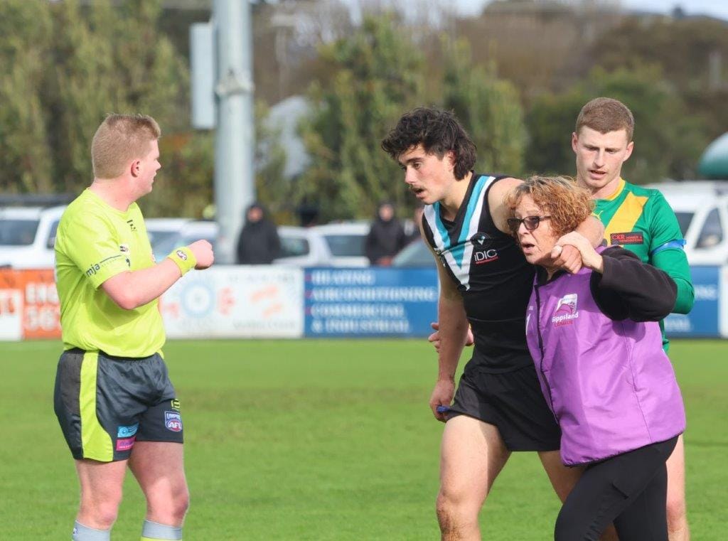 Key Power playmaker Ryan Sparkes leaves the ground early after a heavy tackle.