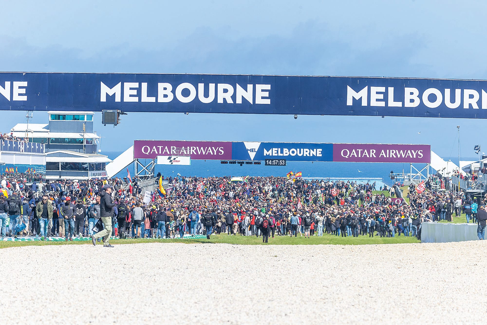 Fans flood onto the track after the 2024 Australian MotoGP at Phillip Island in what has become a tradition which will be repeated in 2025. Photo: Peter Cleeland.