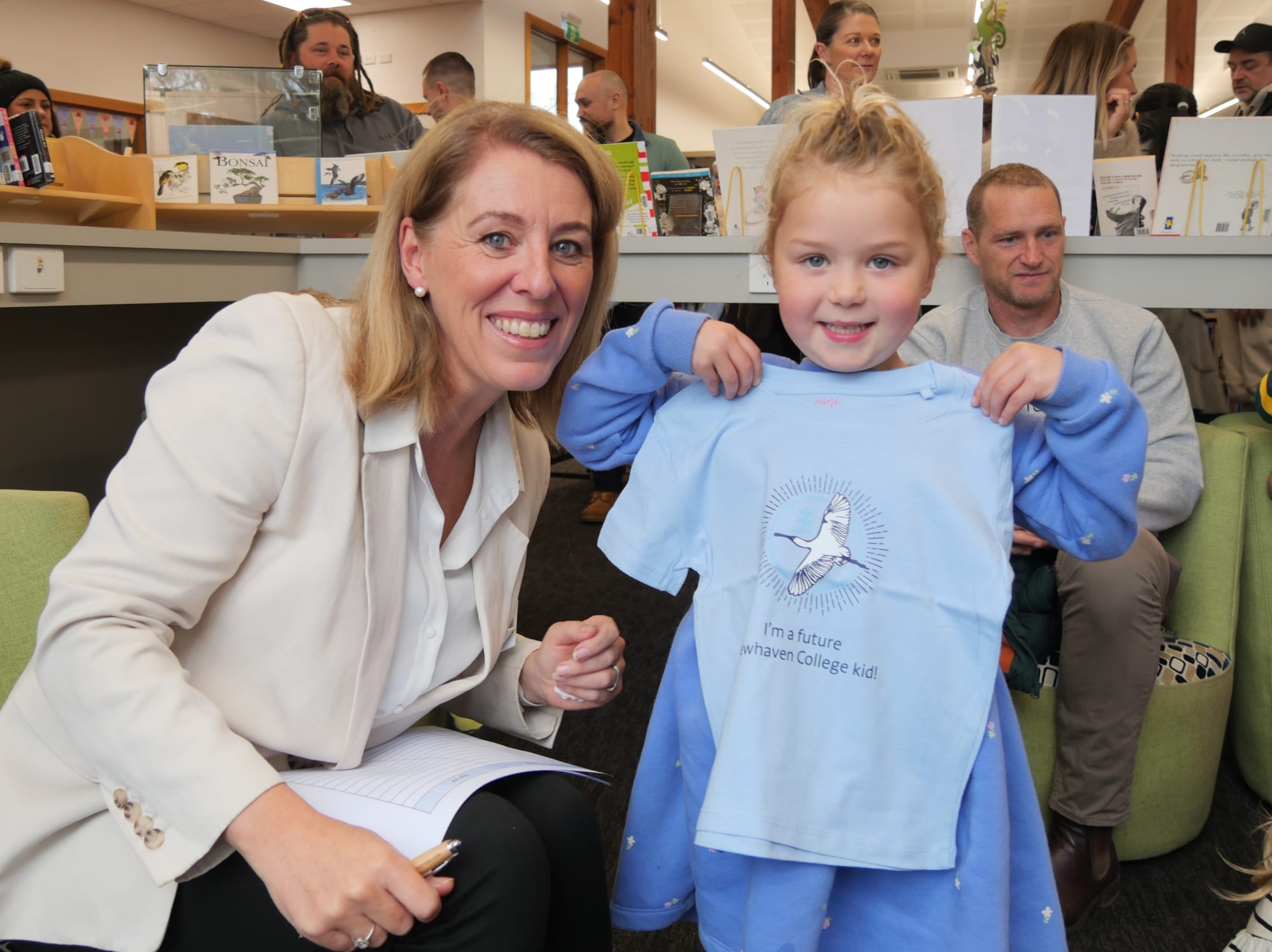 Head of Junior School Cath Huther, pictured with Annika, distributes special T Shirts for the Preps during their transition program. 
