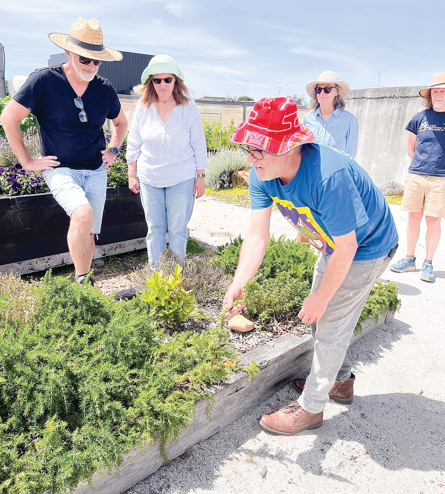 Permaculture teacher Rick Coleman with workshop participants.