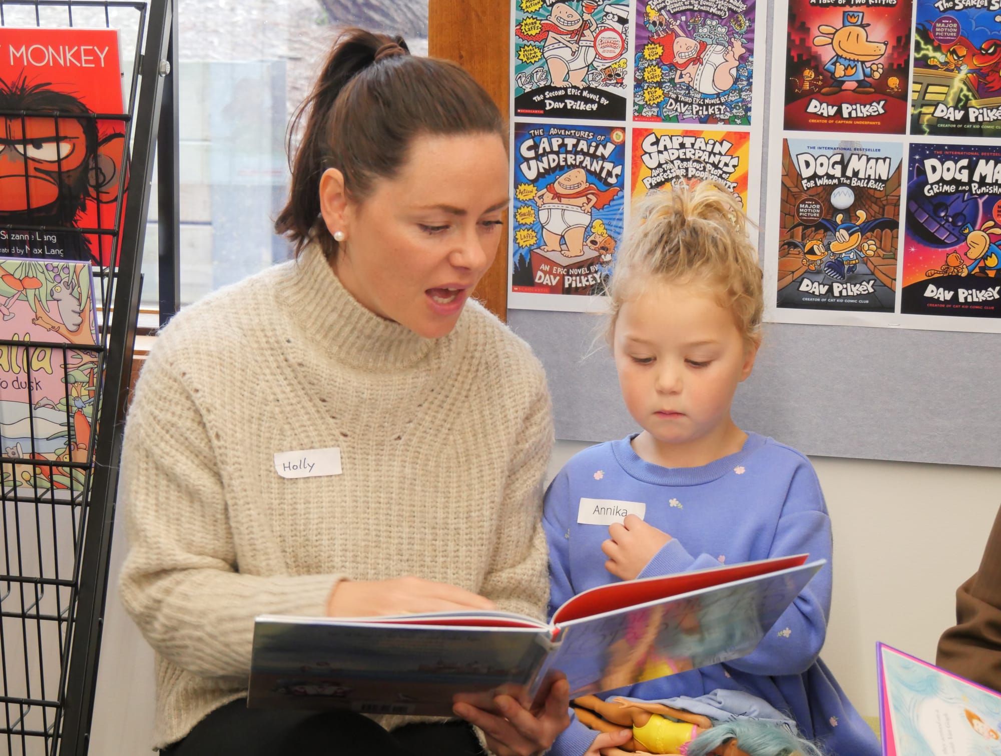 Mum Holly reads with 2026 Prep Annika during the one of the library sessions.