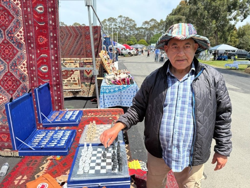 Arif Sadath of Melbourne, formerly of Afghanistan, had a fine array of rugs and handicrafts on sale at the Foster market on Sunday.
