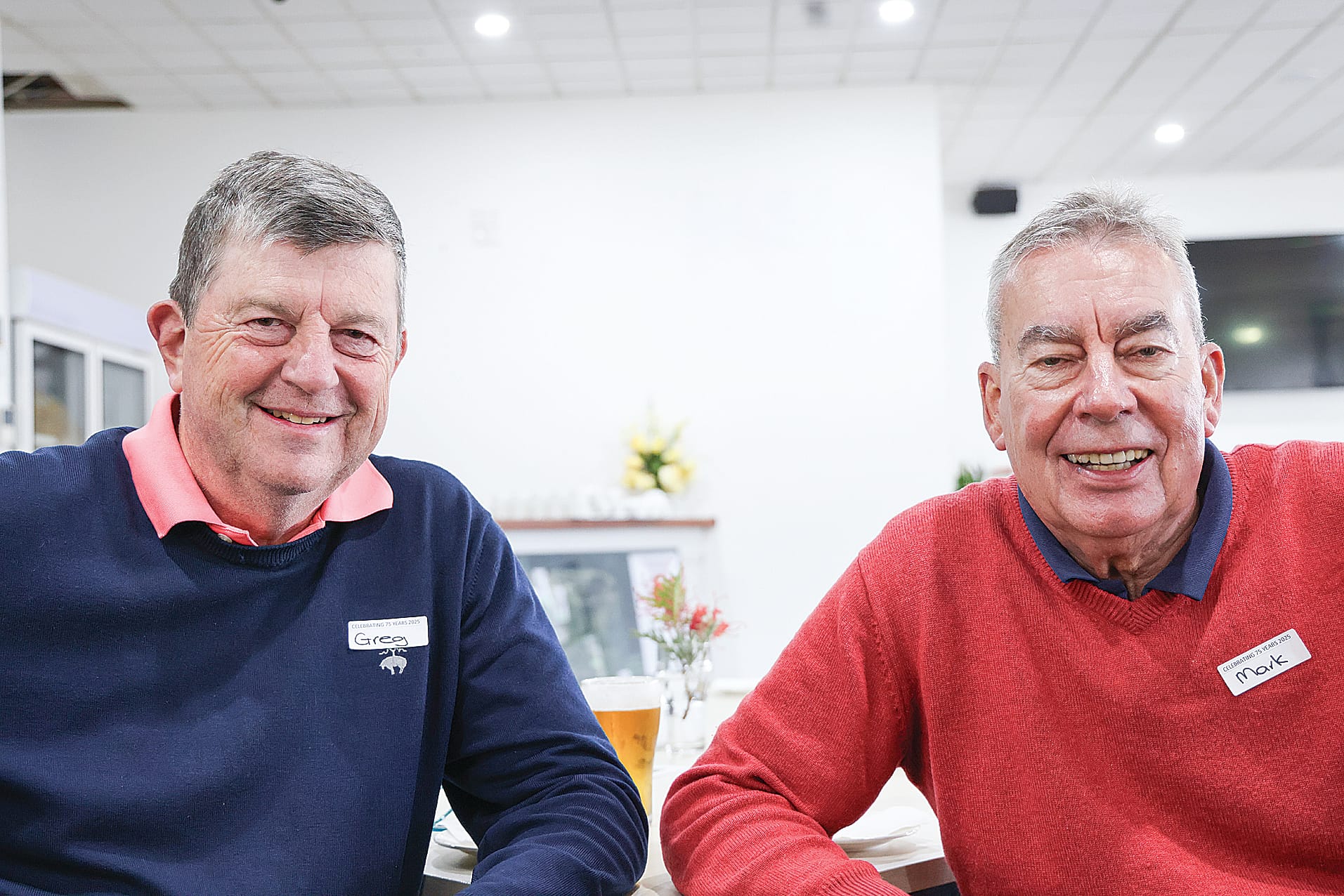 Phillip Island Golf Club treasurer Greg Williams and board member Mark Reid celebrating the club’s 75th anniversary. B75_4625