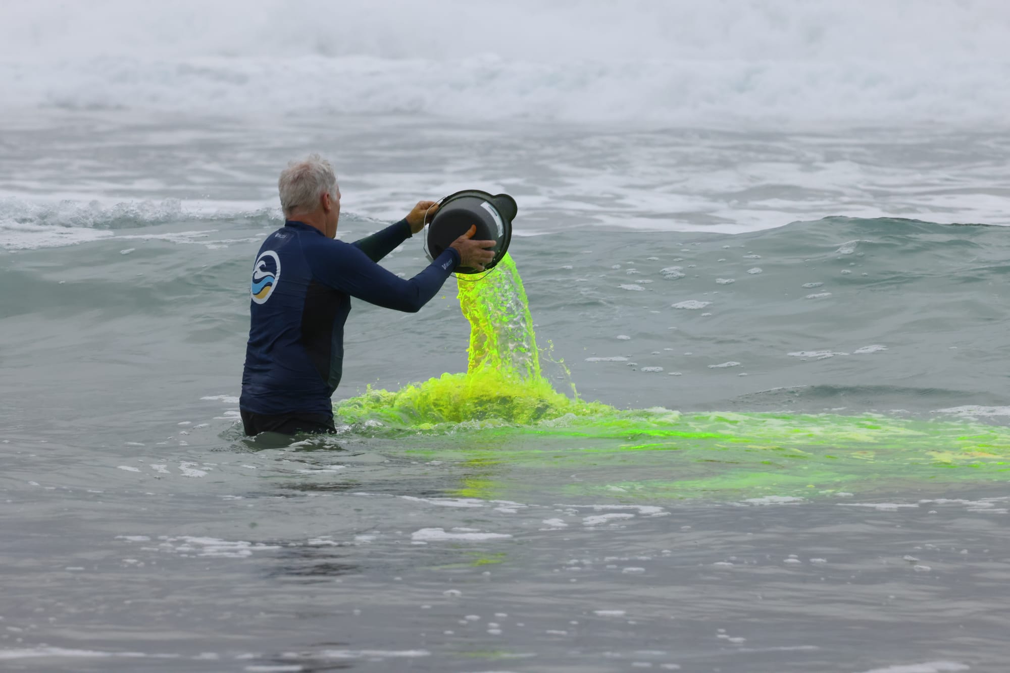 Green dye used to show the power of rips at Cape