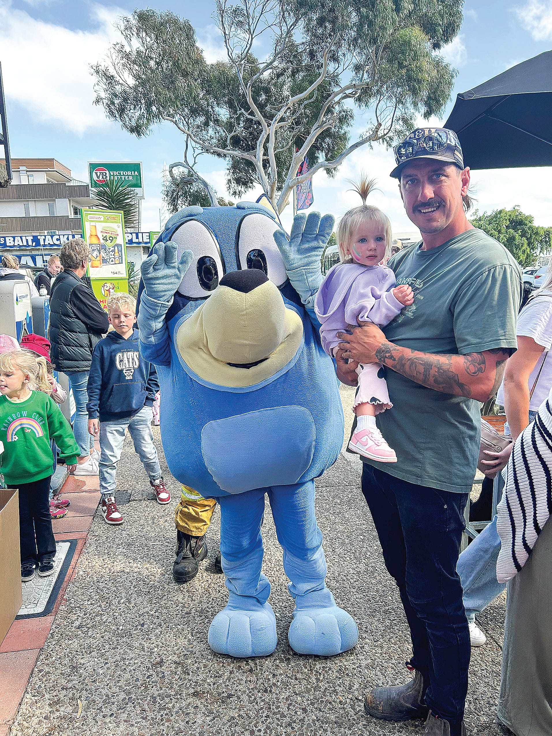 The arrival of 'Bluey' at the Royal Children's Hospital Good Friday Appeal event at San Remo was a big hit with the kids, many of whom had taken part in the Walk for the Kids fundraiser.
