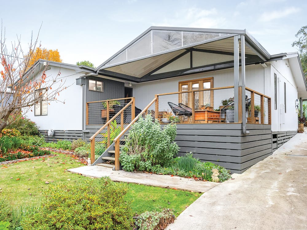 Modern home offering serene views of the rolling Loch Hills post image