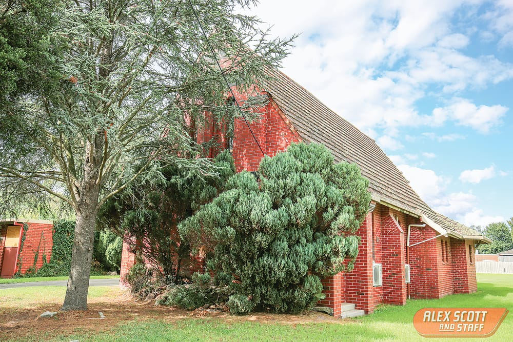 Own the historic red brick church post image