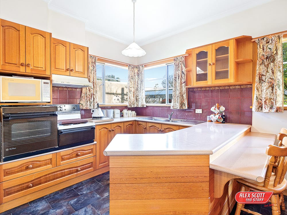 Brick home on a corner allotment post image