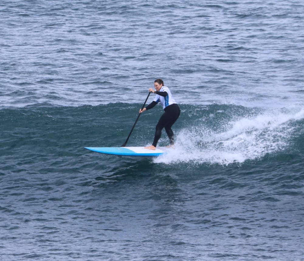 Stand-up Paddleboard surfers beat the storm at Phillip Island post image